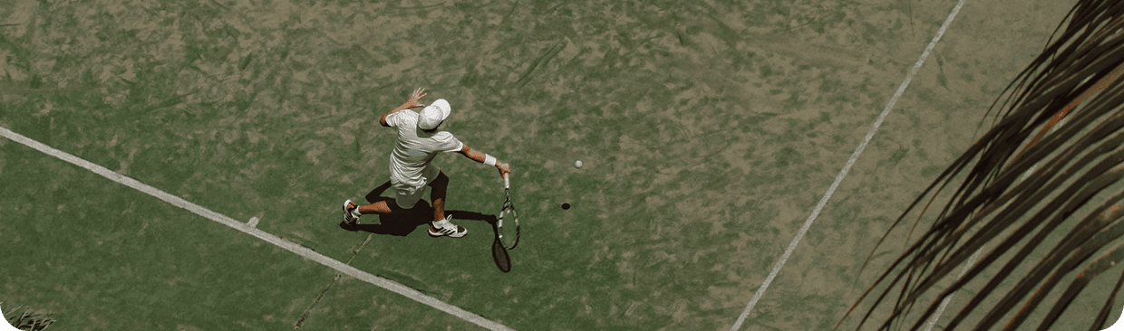 Tennis player on court from above